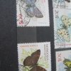 Семь марок с изображением бабочек Монголия